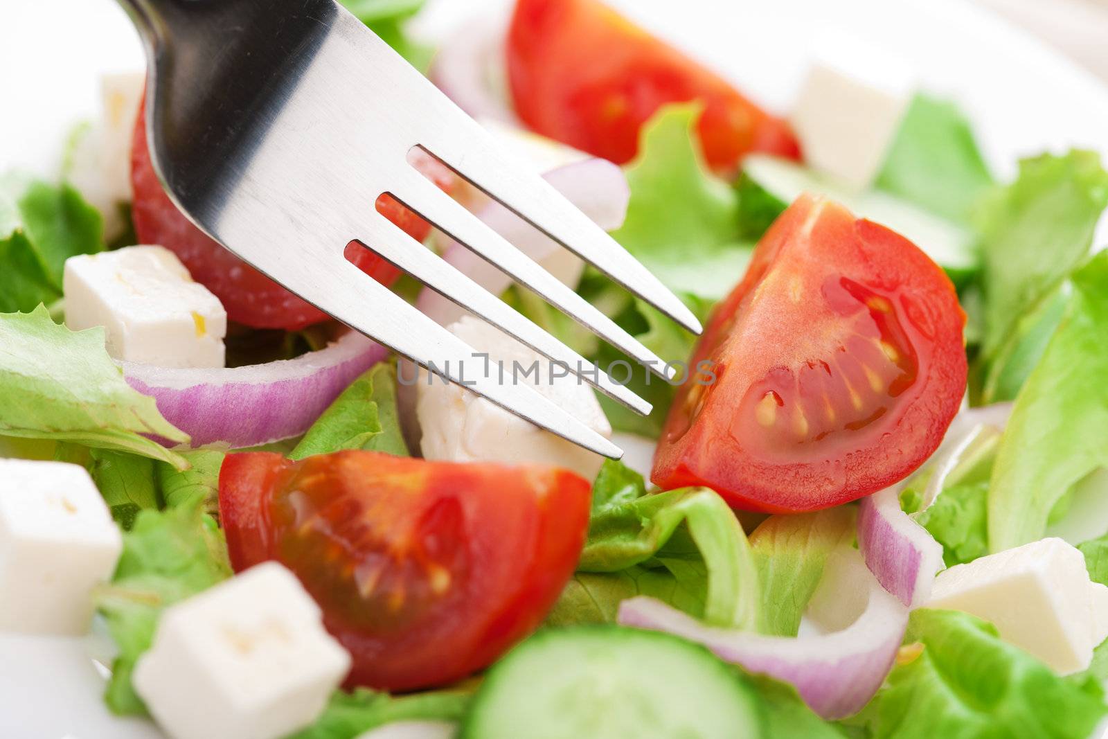 fresh salad and fork