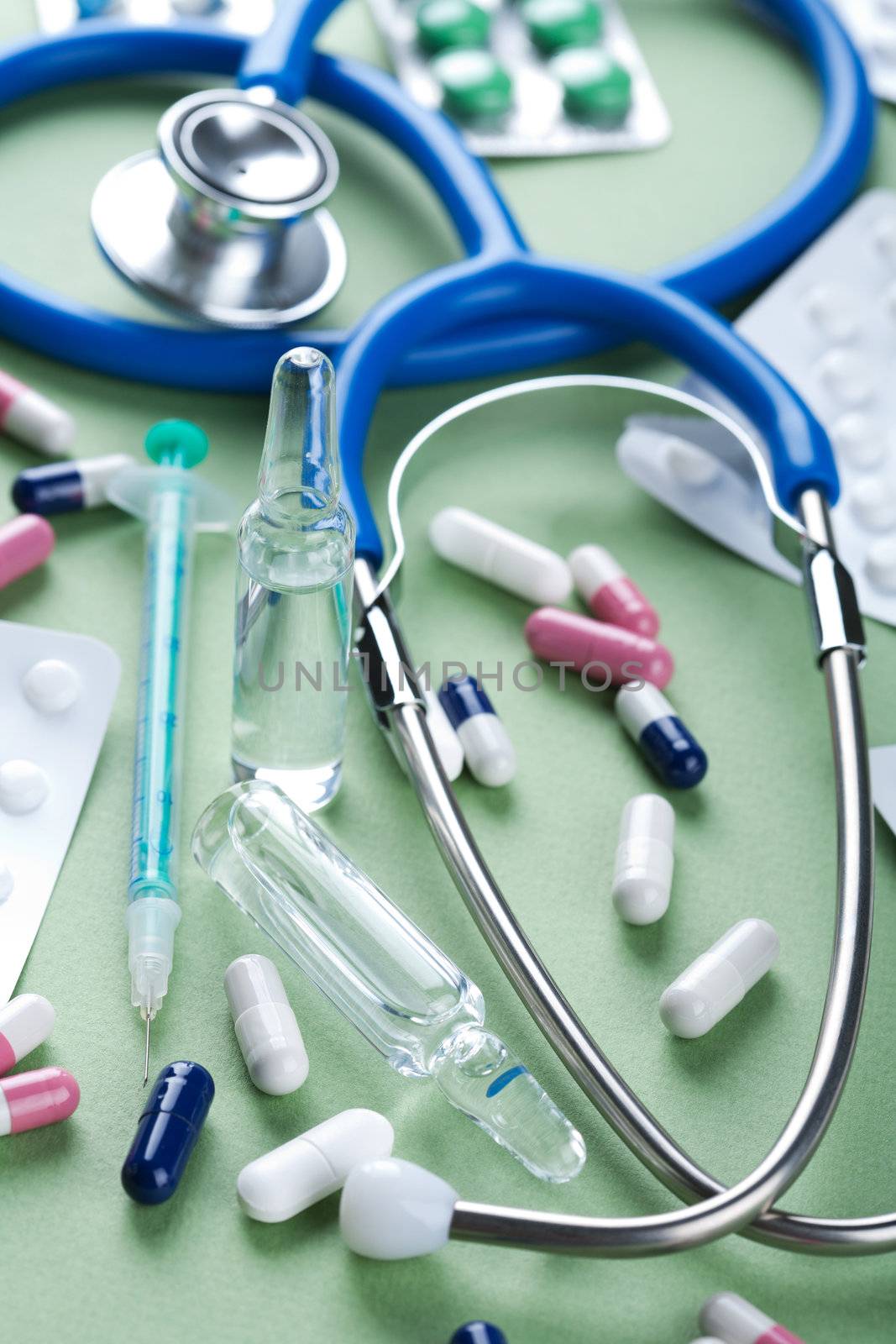 stethoscope and pills