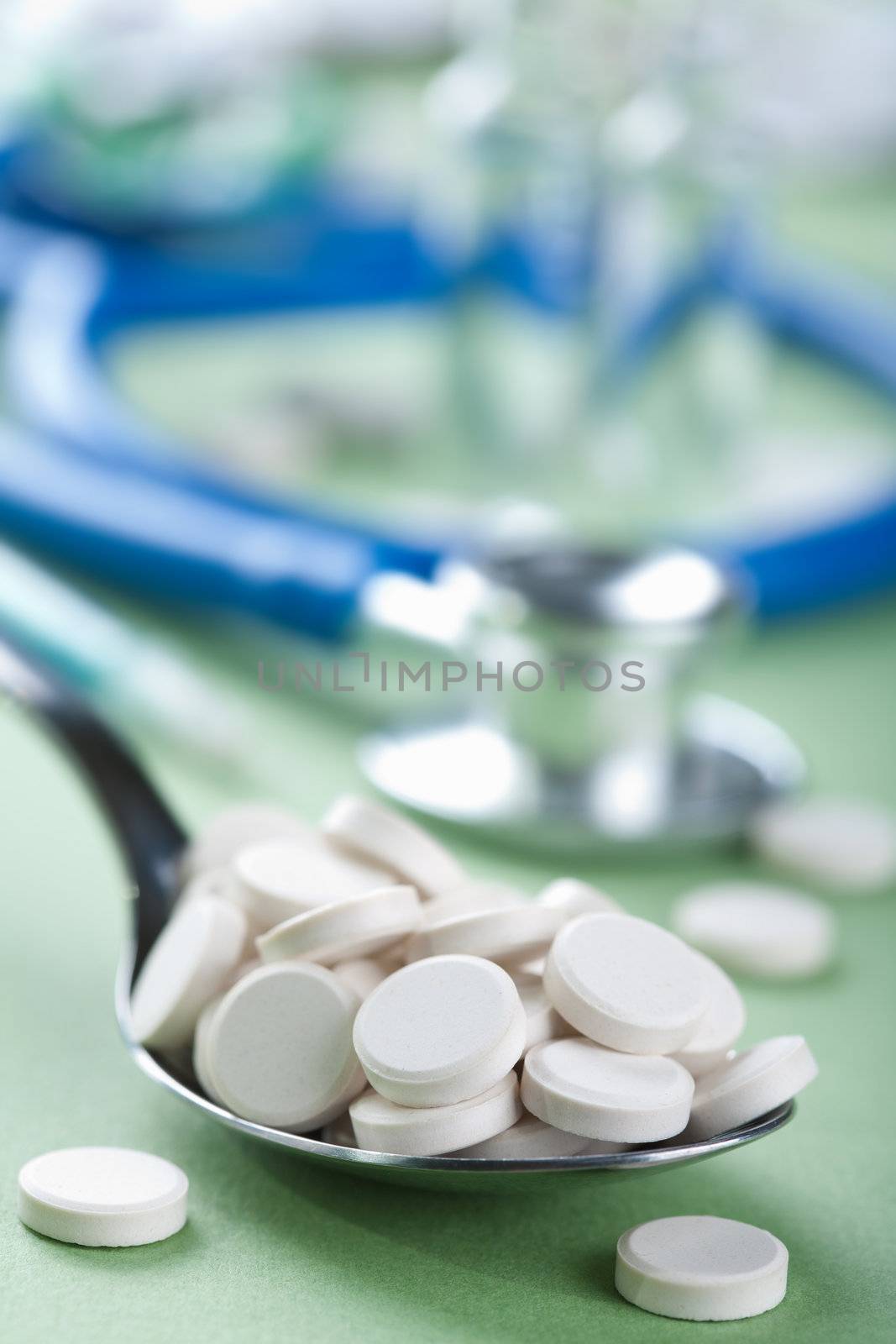 pills in spoon
