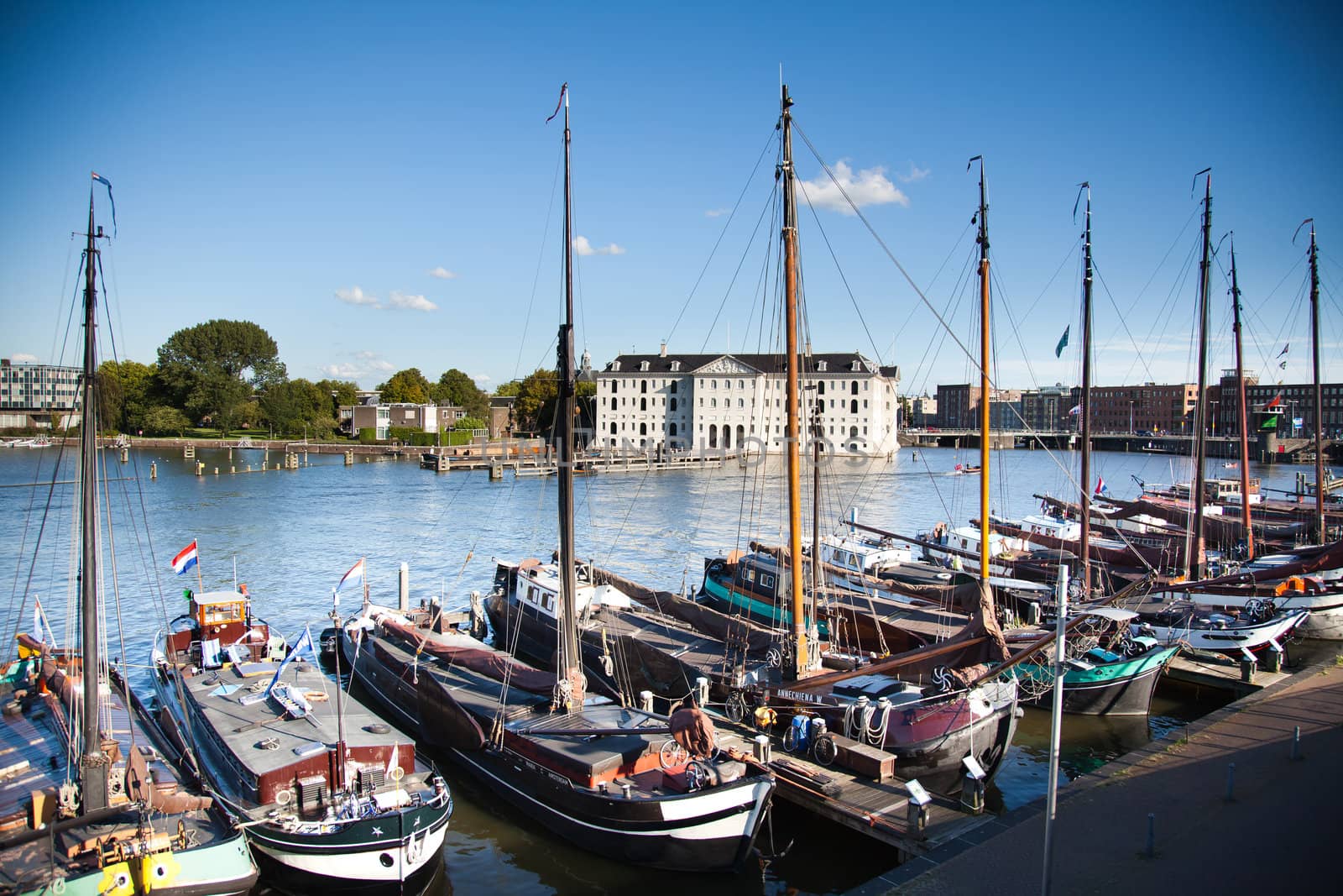 old boats at the bank of Amsterdam's canal by furzyk73