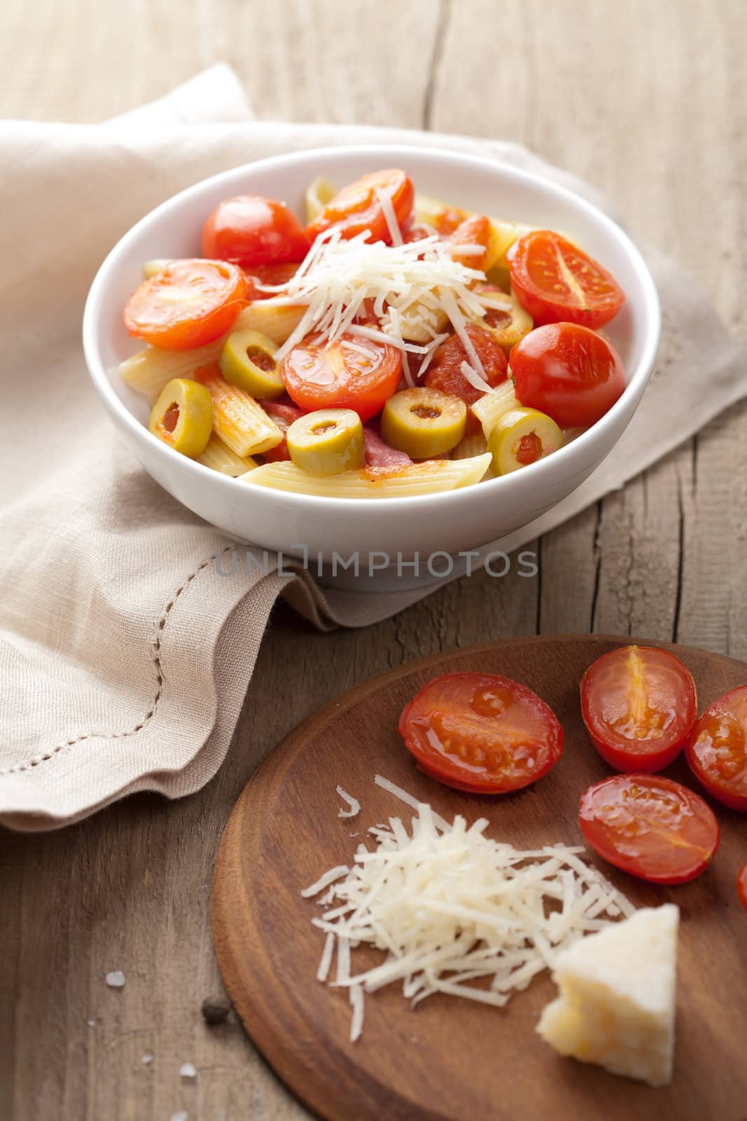 pasta with tomatoes and salami