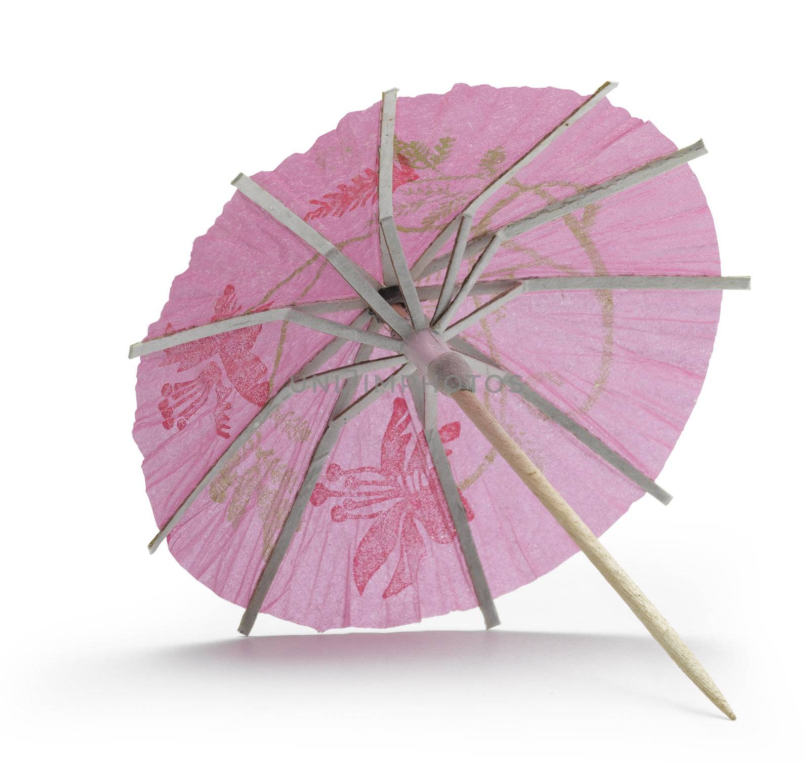 rose cocktail umbrella on white background
