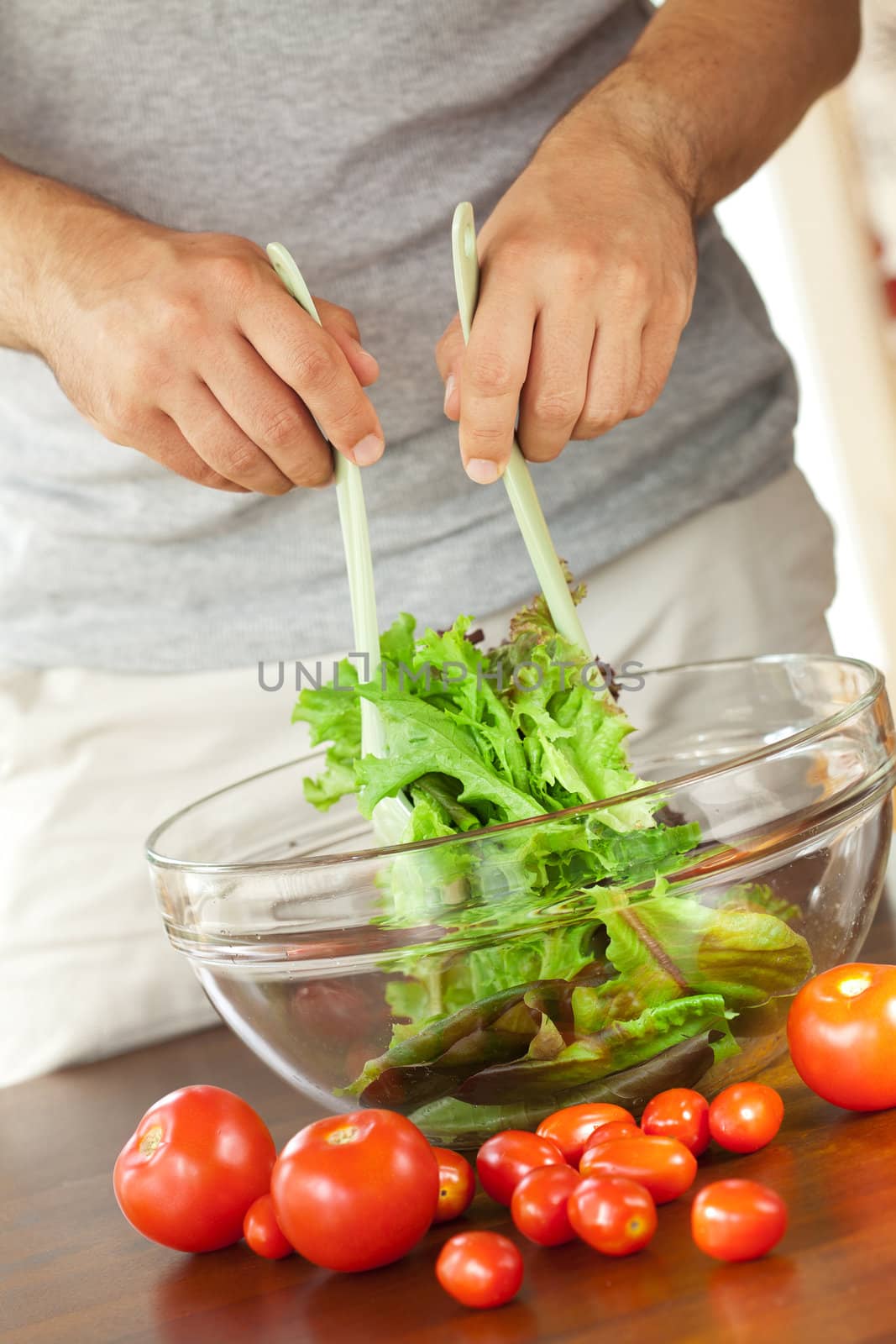 man preparing salad 