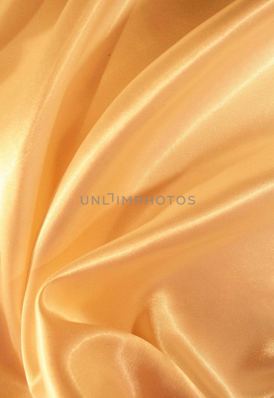 Smooth elegant golden satin as background