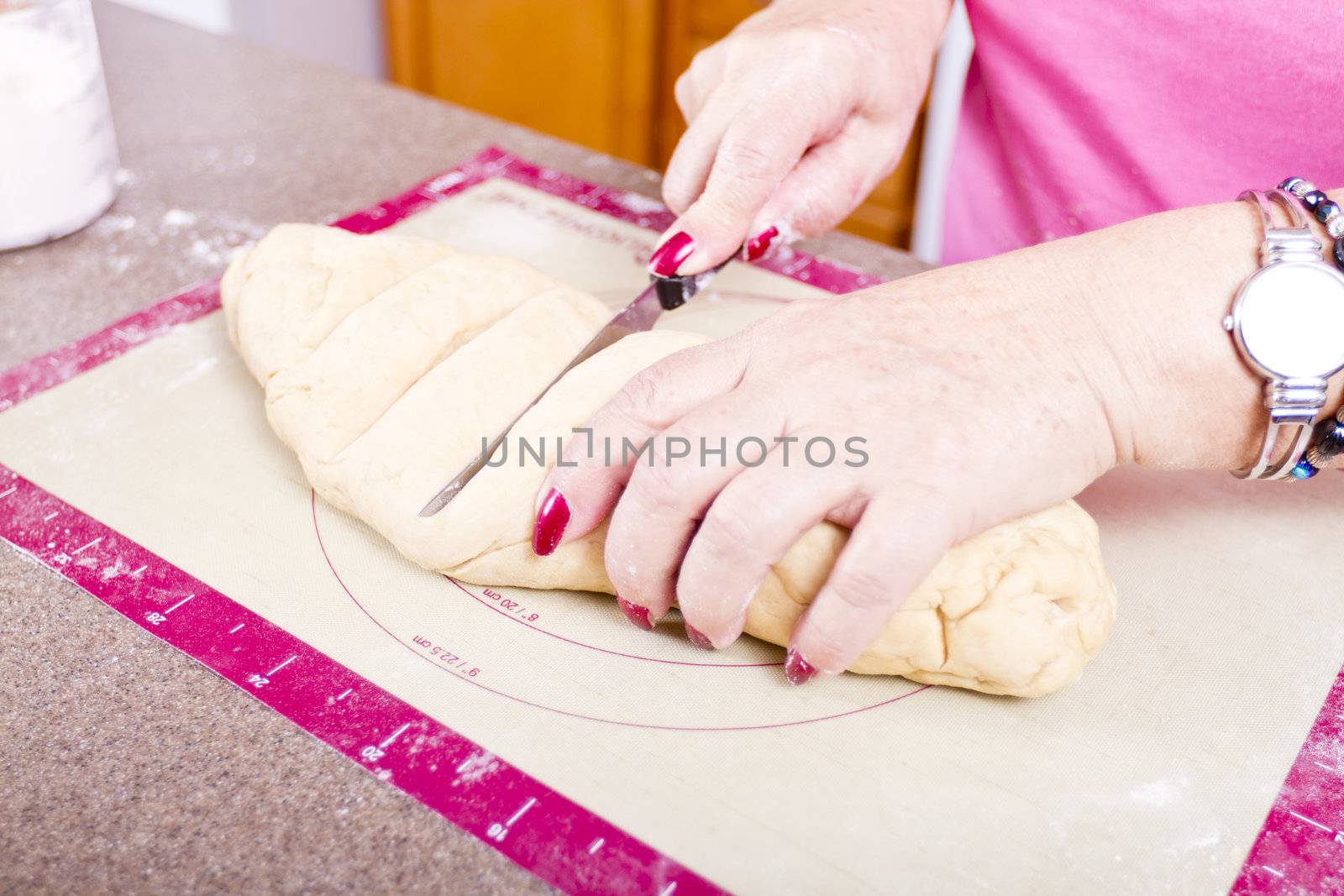 Cutting Turkish Pide pockets doughs.