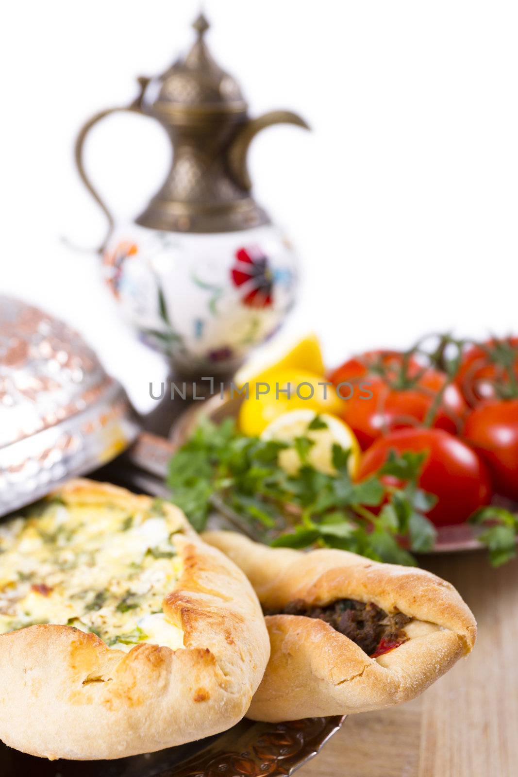 Turkish Pide garnished with vegetables by coskun