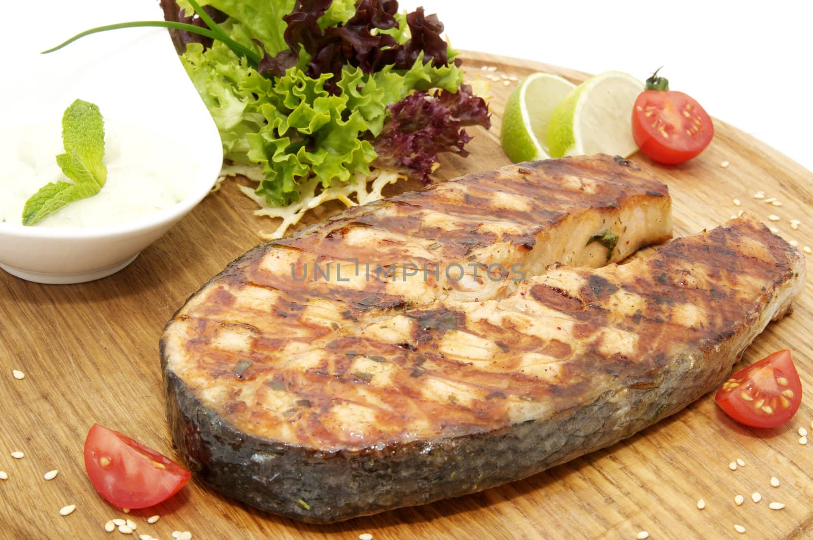 succulent salmon steak cooked on the grill