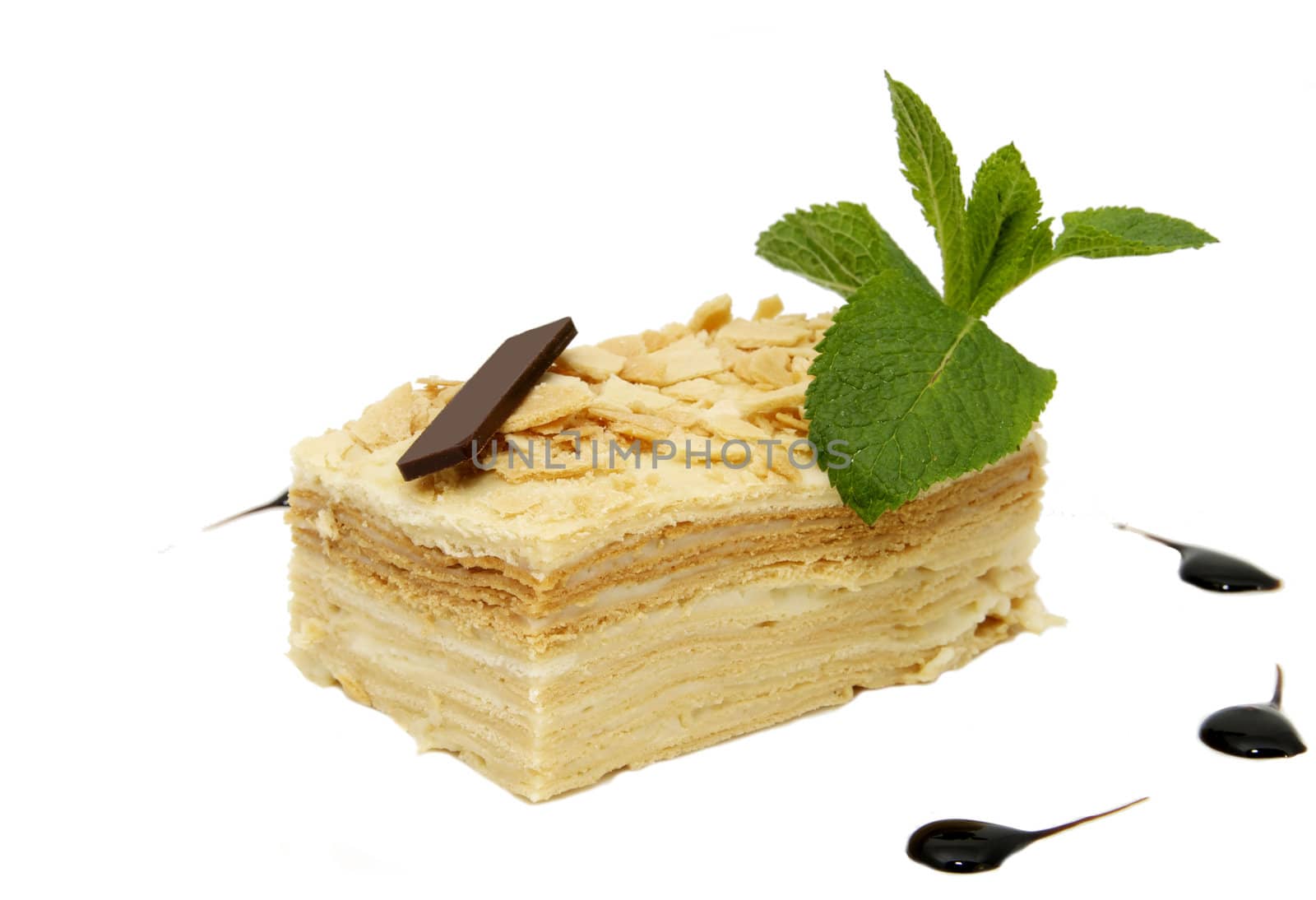 piece of layer cake decorated with mint