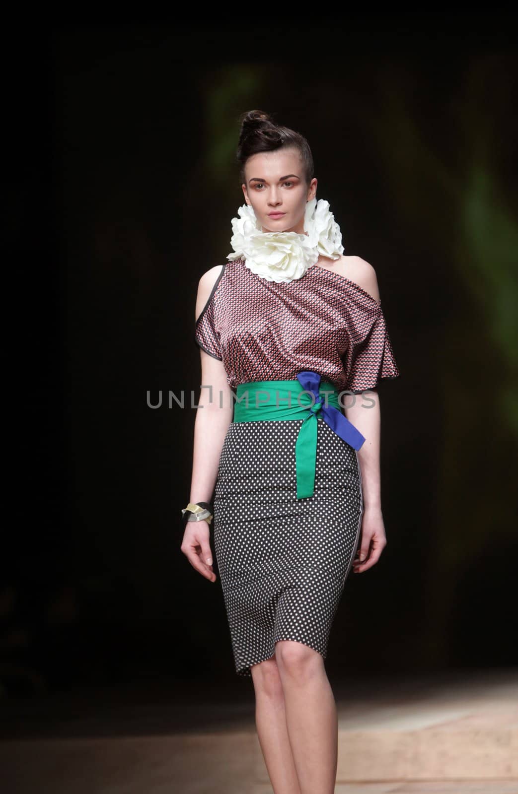 ZAGREB, CROATIA - MARCH 22: Fashion model wears clothes made by Image Haddad on "CRO A PORTER" show on March 22, 2012 in Zagreb, Croatia.