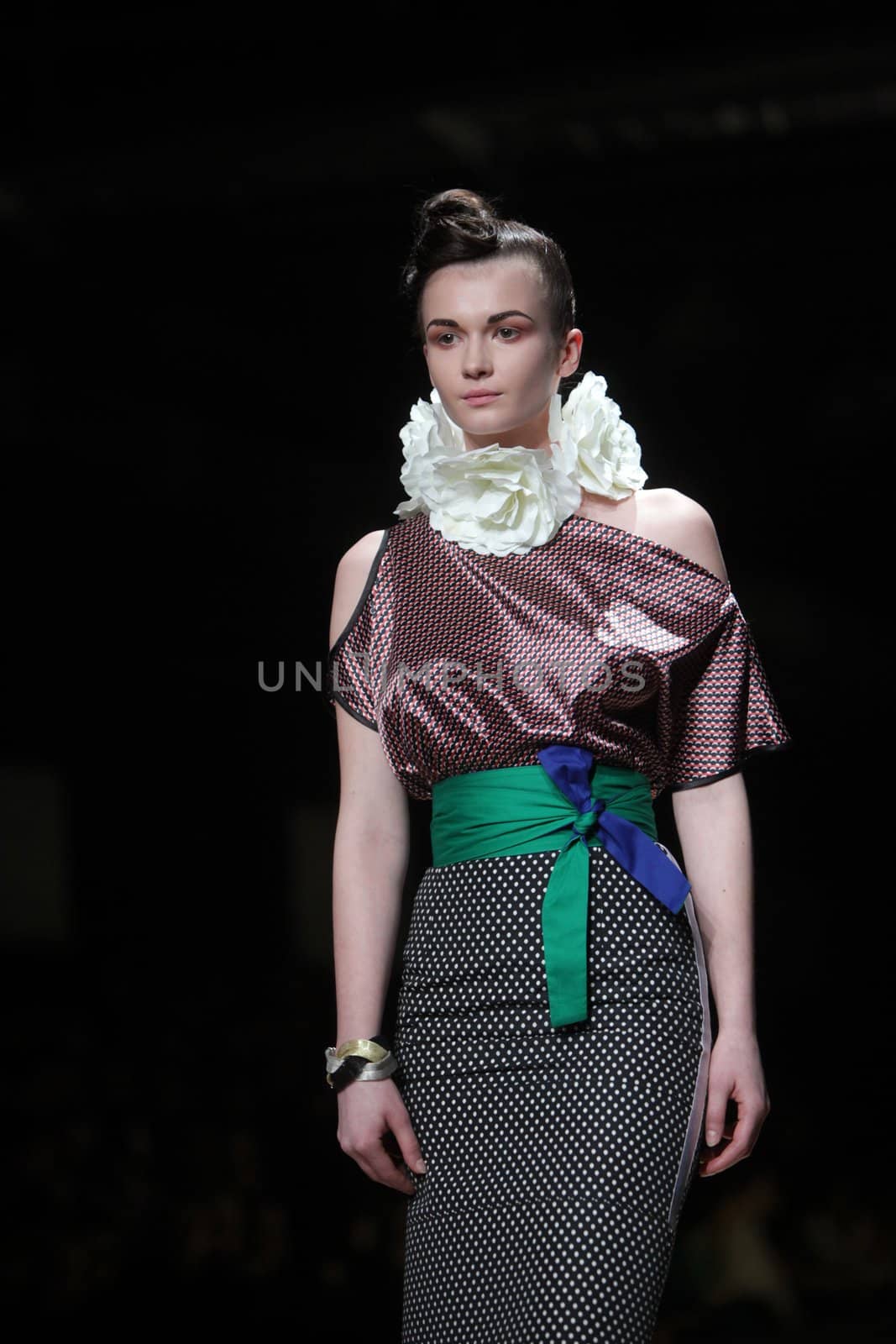 ZAGREB, CROATIA - MARCH 22: Fashion model wears clothes made by Image Haddad on "CRO A PORTER" show on March 22, 2012 in Zagreb, Croatia.