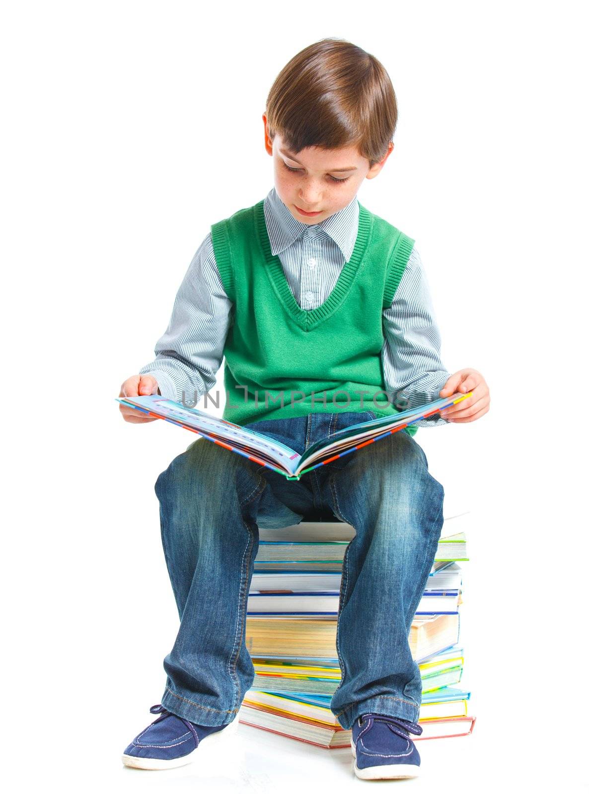 Education - funny boy with books. Isolated over white background.