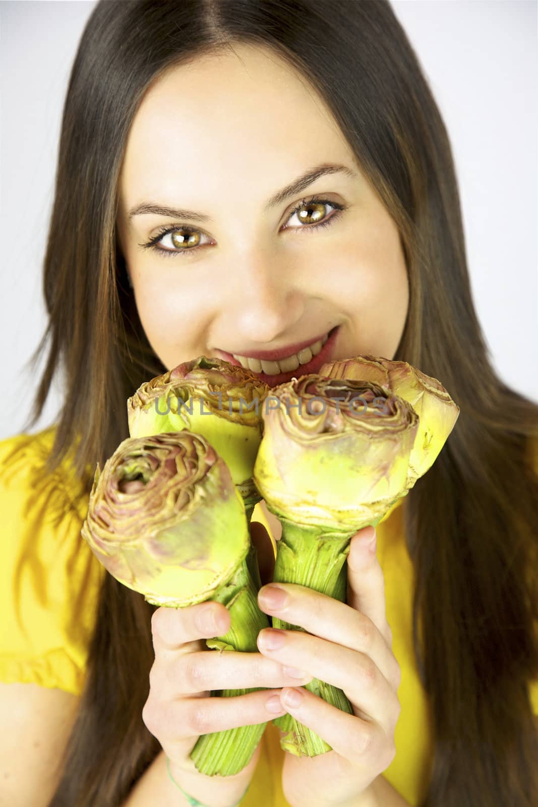 Girl with four artichokes in her hand by fmarsicano