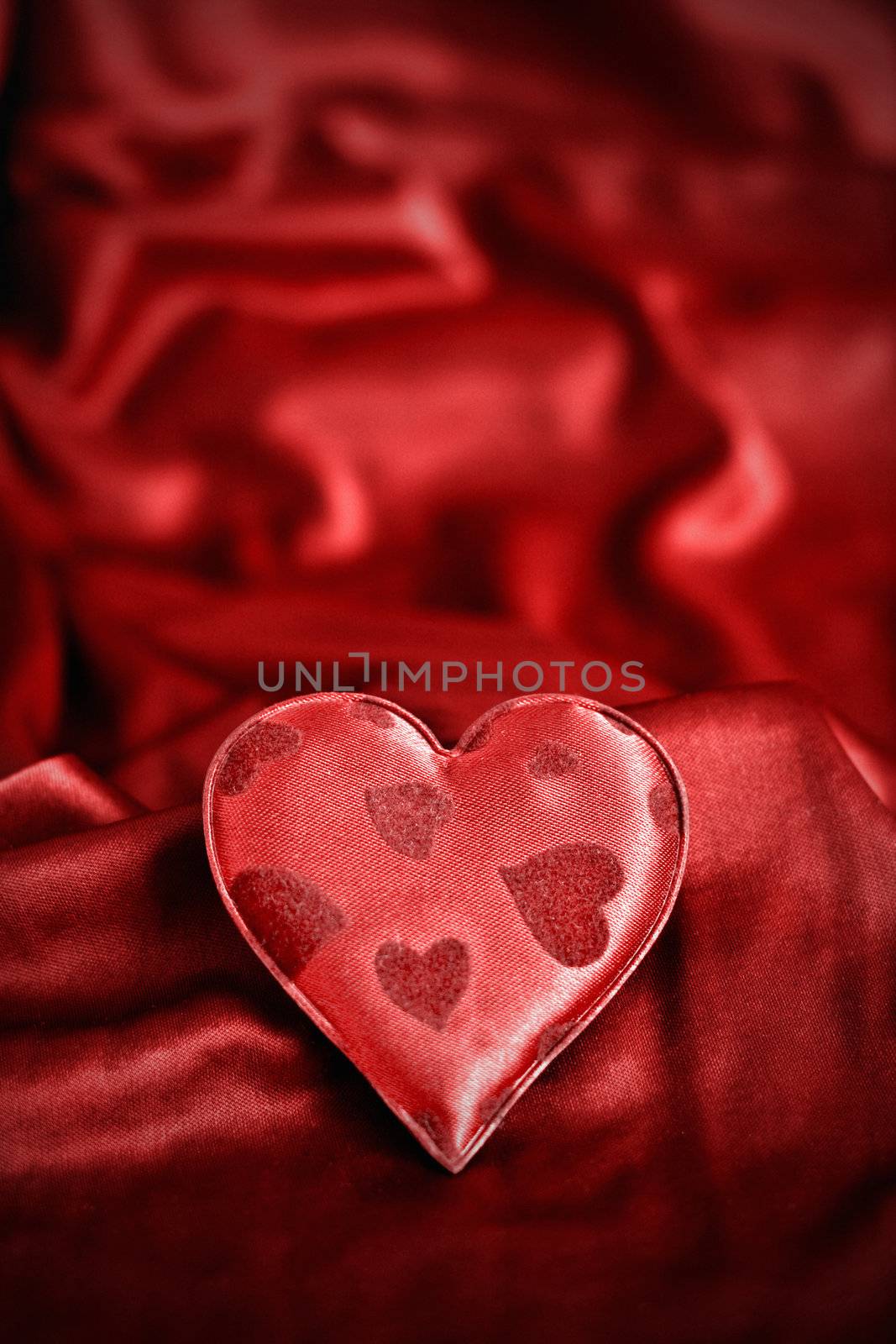 background with a heart shape and silk