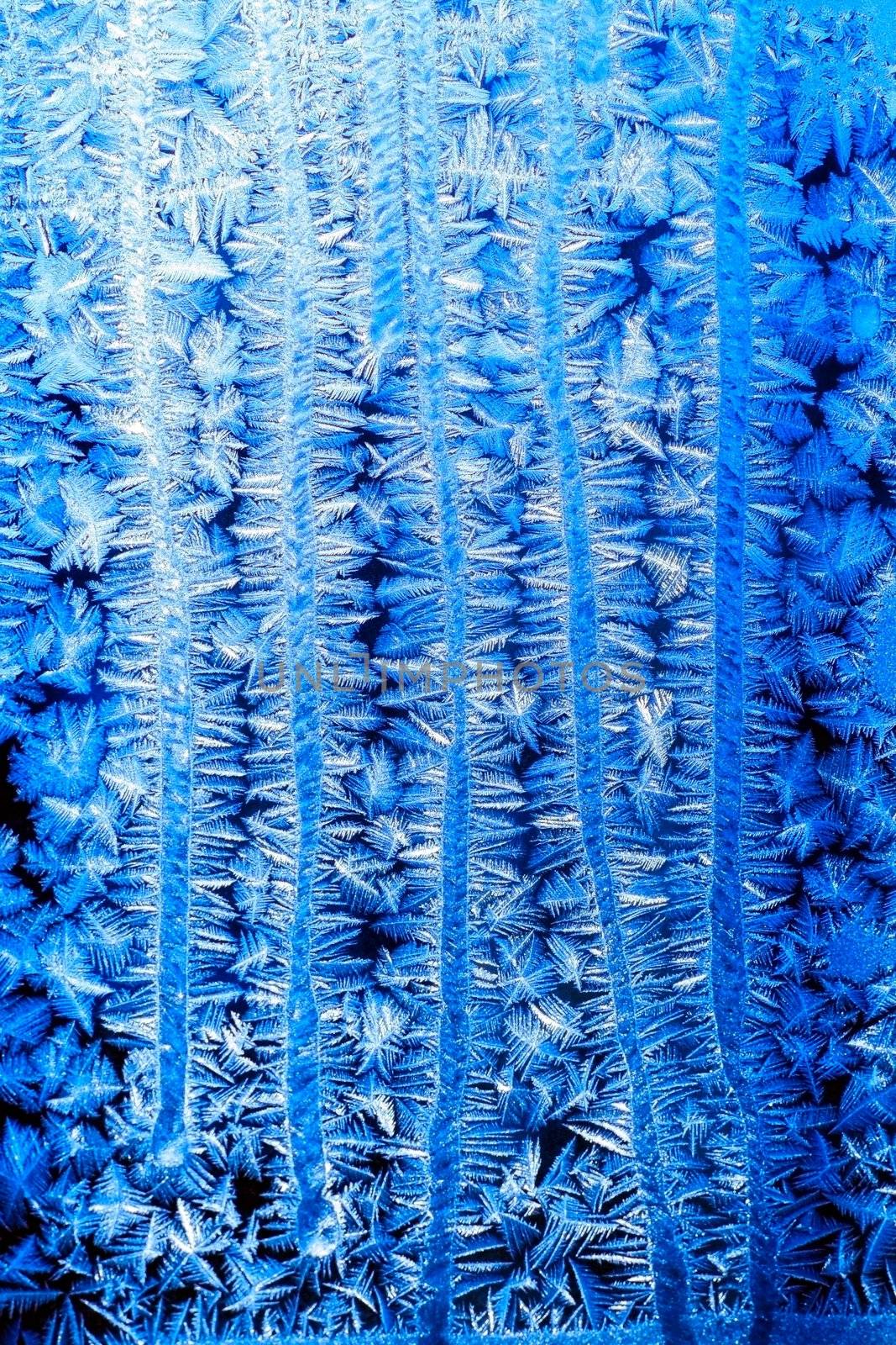 blue pattern of frost on the window