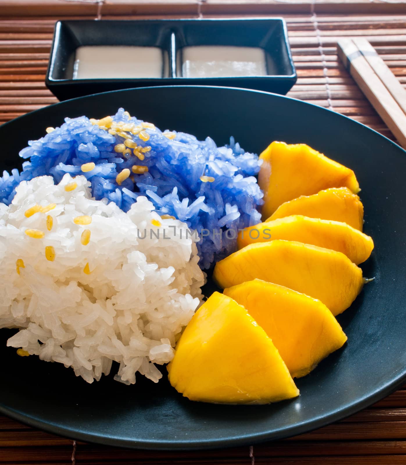 Thai style dessert, glutinous rice eat with mangoes