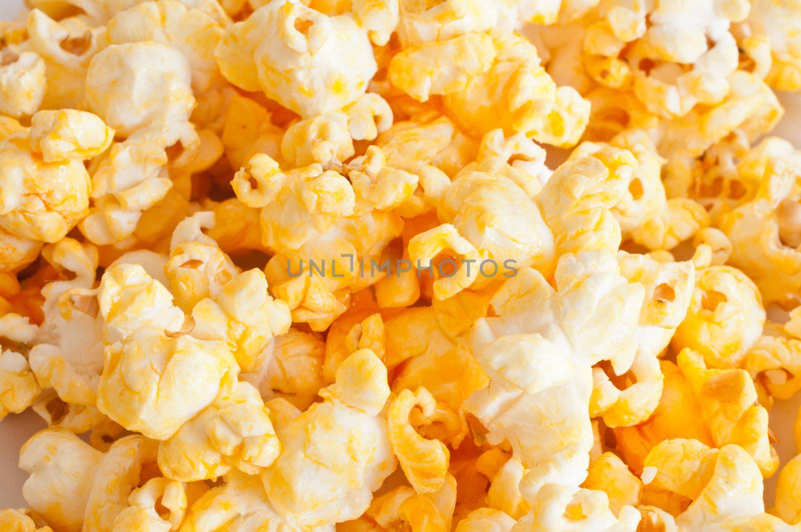Salted popcorn grains closeup