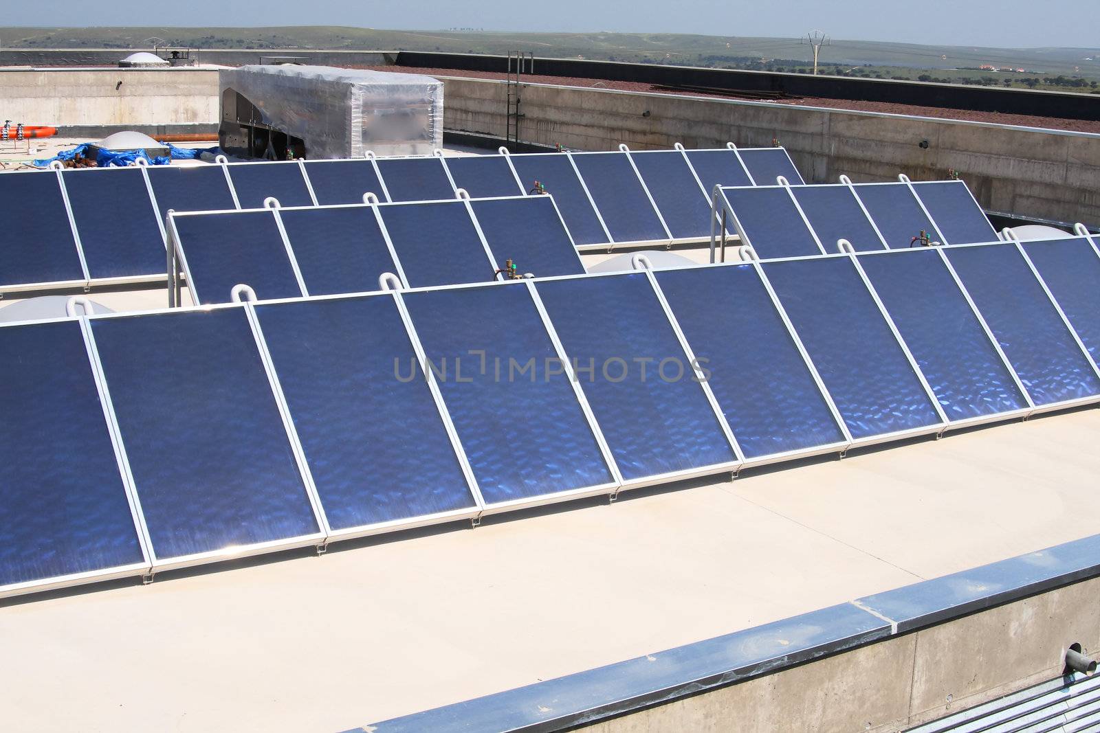 solar on the roof of a building for the hot water and electricity of the common areas