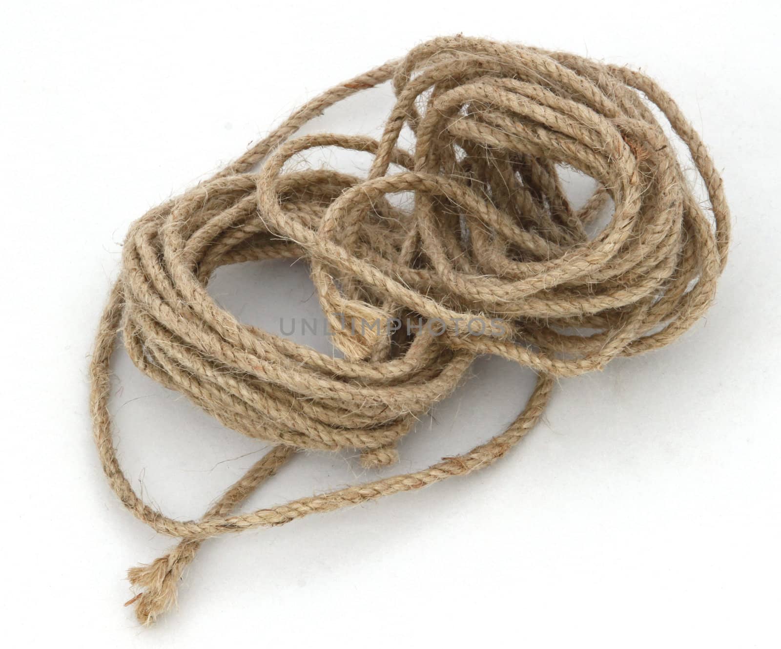 Ball of string or twine on a white background.