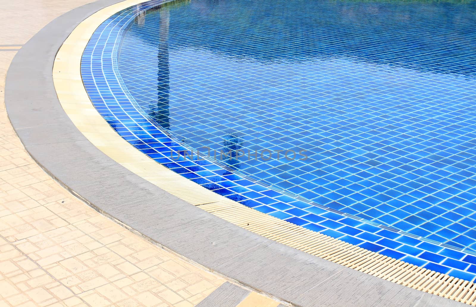 Swimming pool with stair at hotel close up