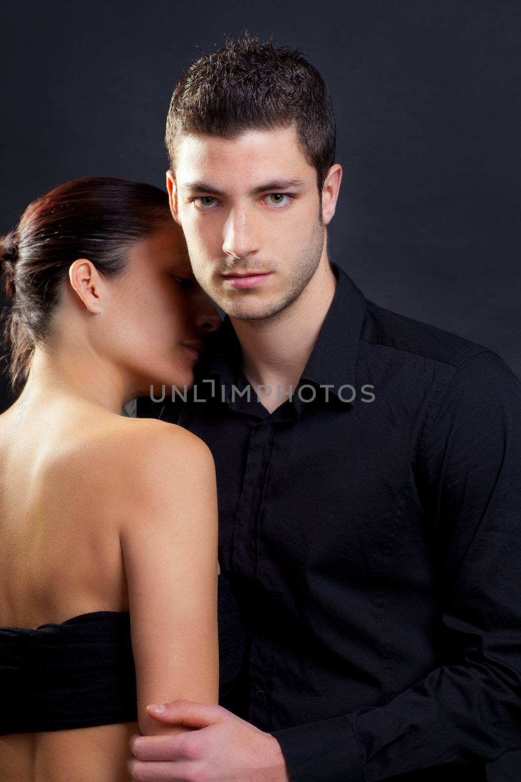 Couple in love with handsome man and rear profile woman nude back