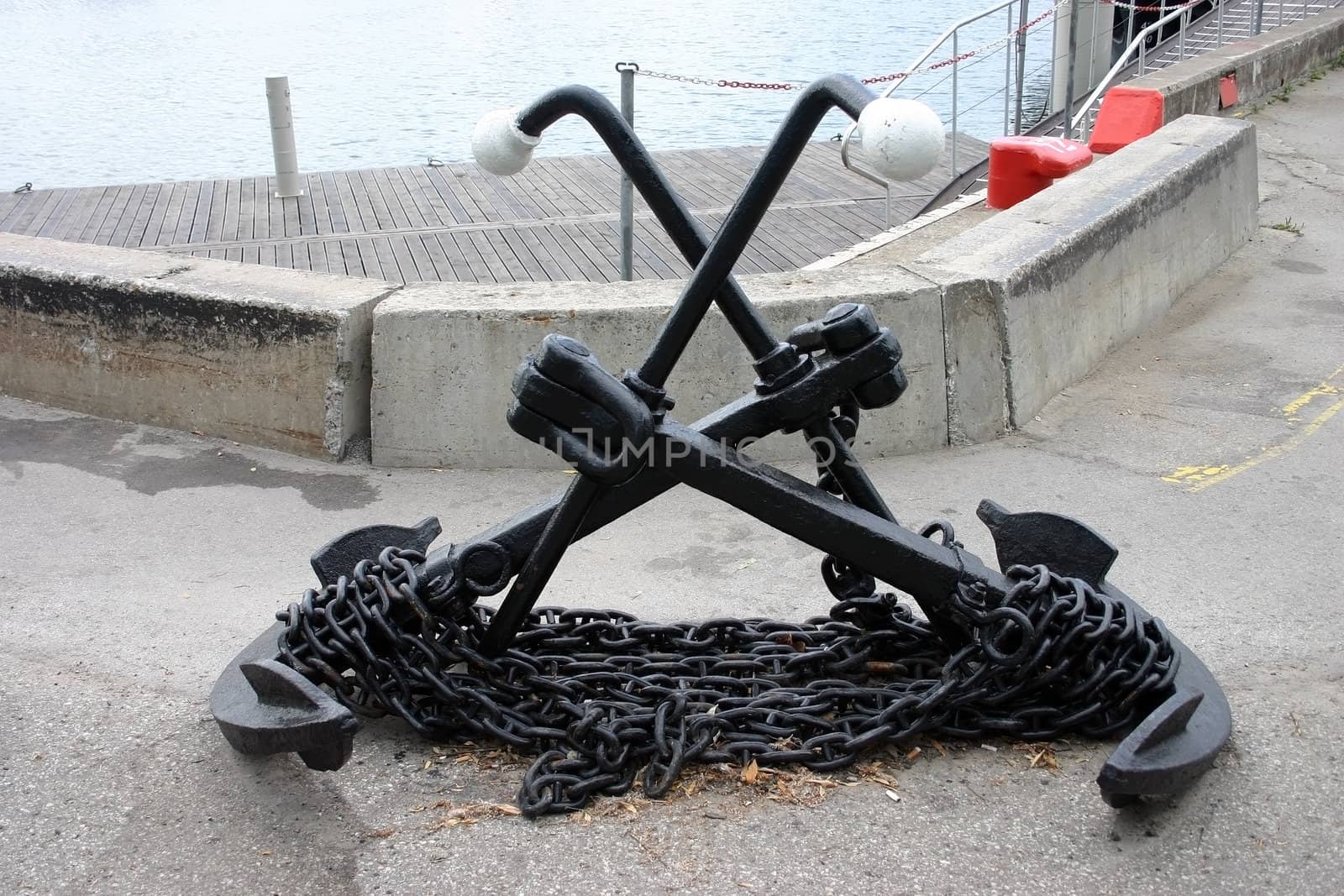 Anchors at a pier by AlexandrePavlov