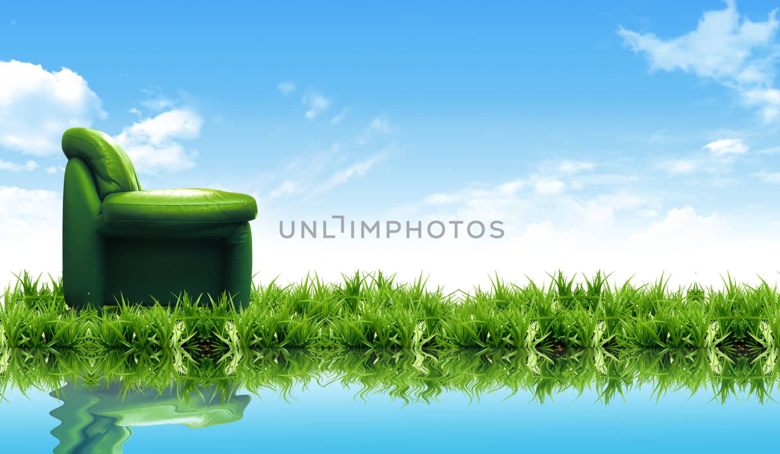 Sofa on the grass with the bright sky by rufous