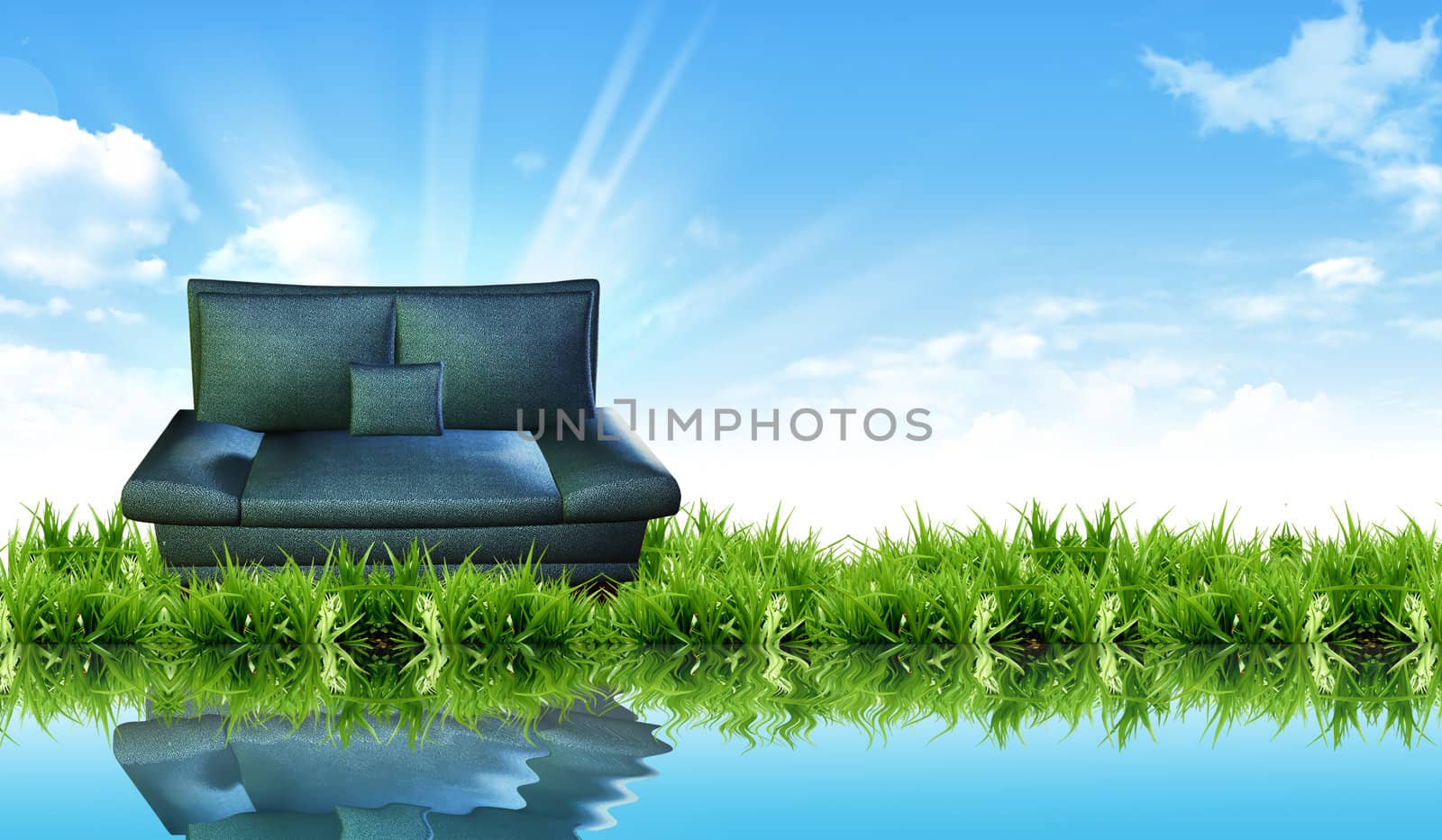 Sofa on the grass with the bright sky