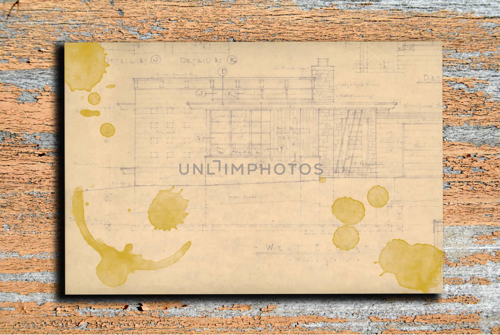 Vintage paper with coffee stains on wooden background