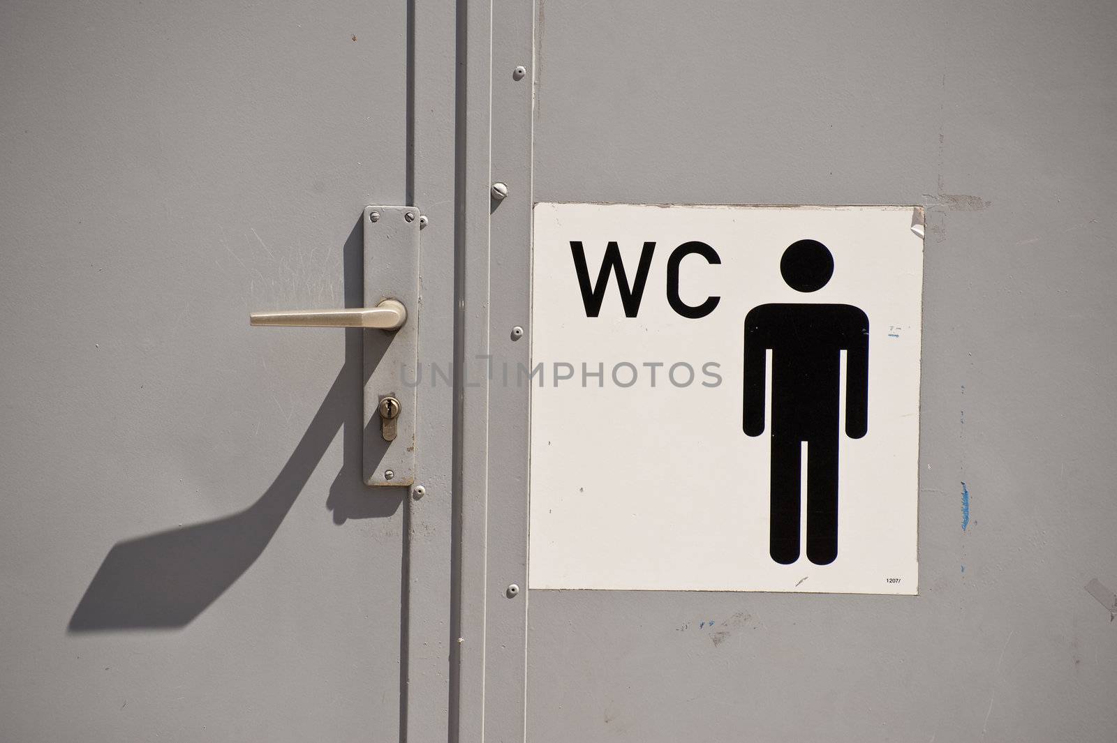Close up of a toilet door