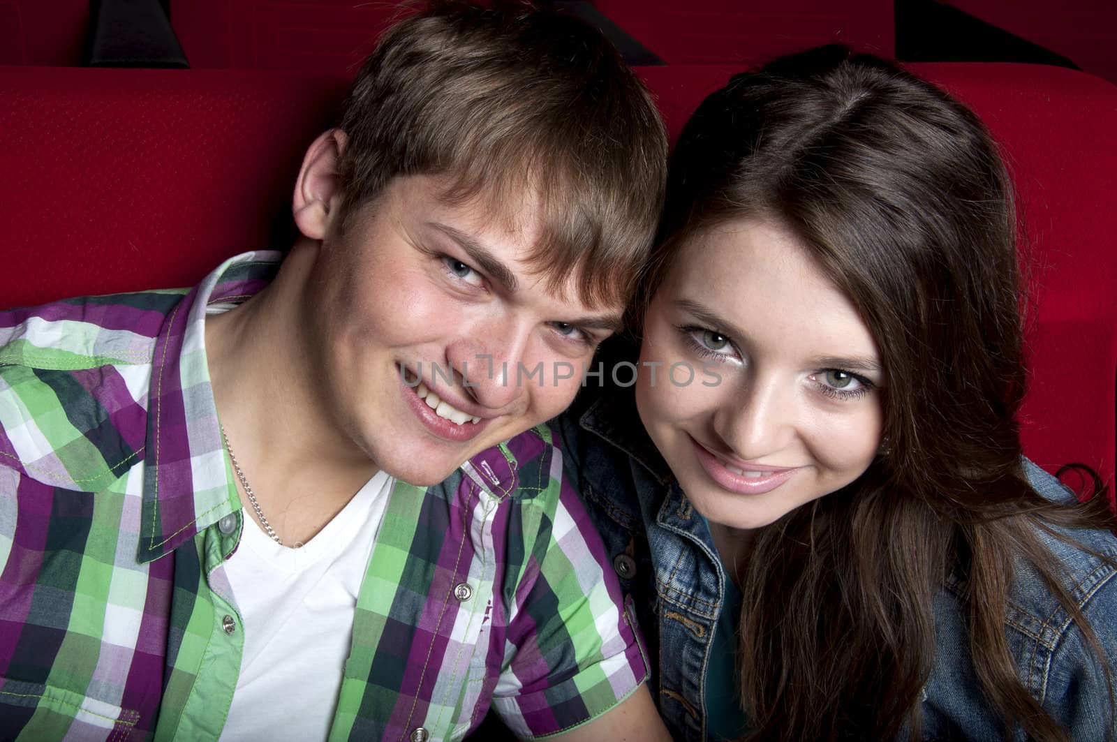 couple in a movie theater, watching a 3D movie