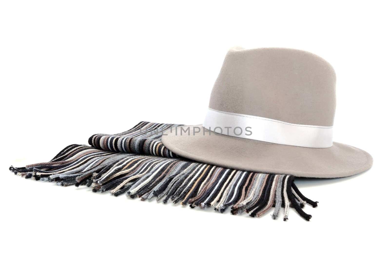 grey hat and scarf over white background
