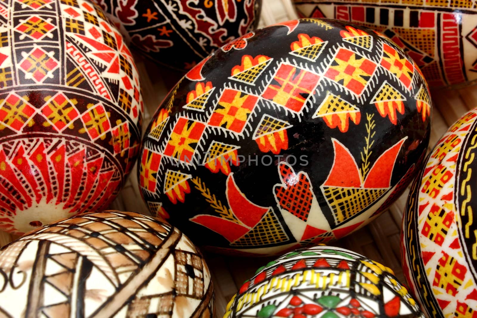 traditional hand painter eggs in a trellis basket