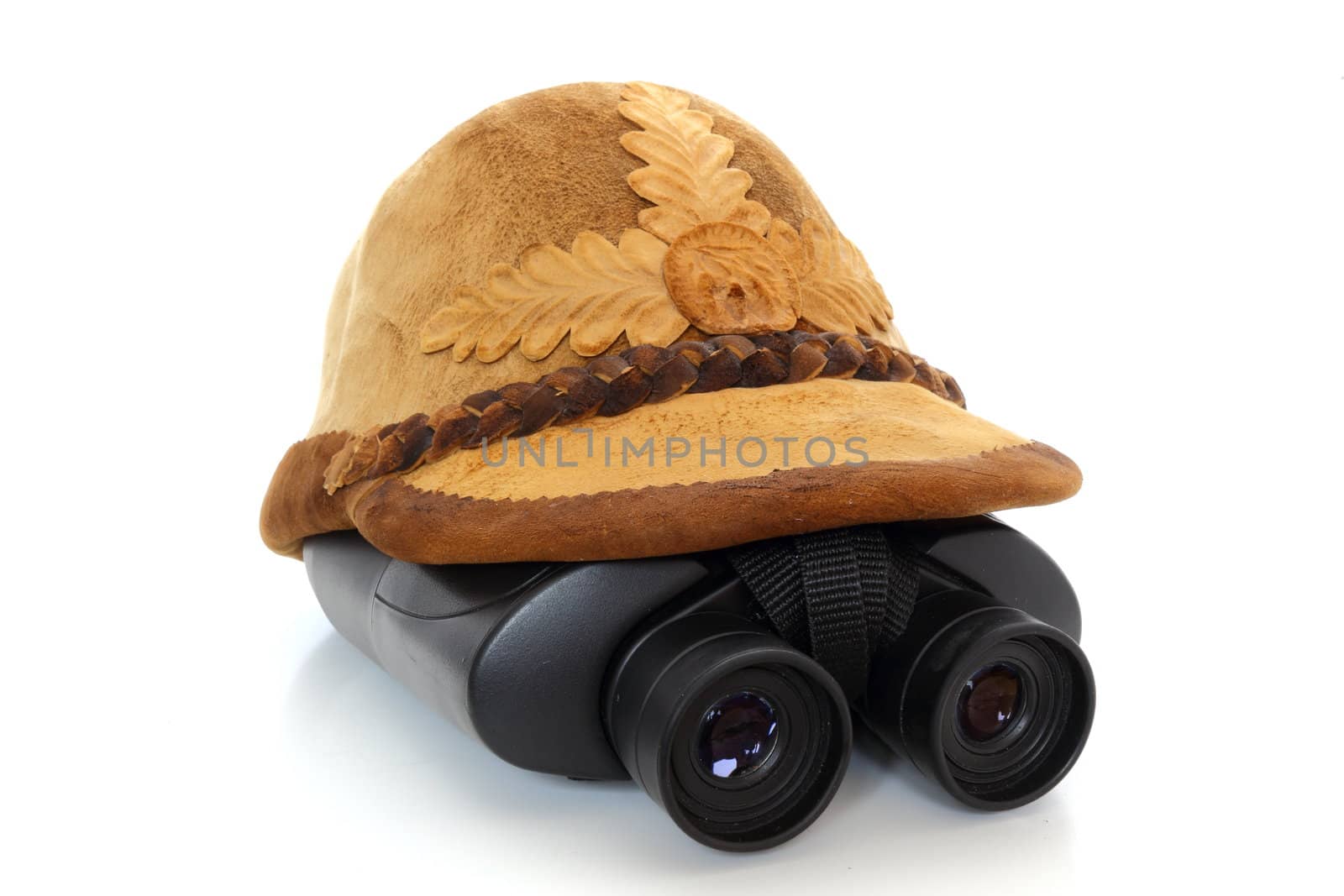 traditional hat and binoculars by taviphoto