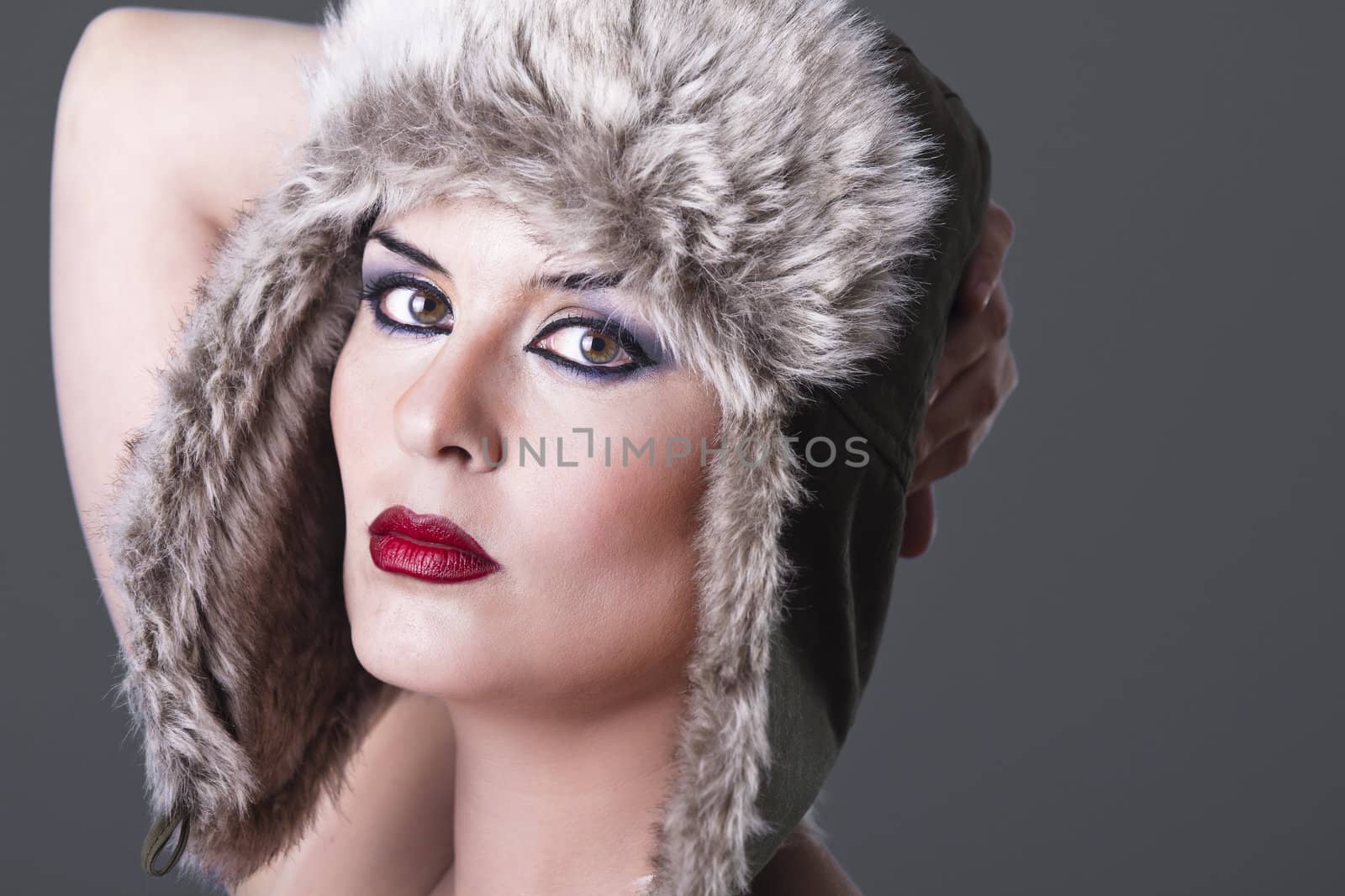 Portrait of sexy beautiful girl with the winter hat on