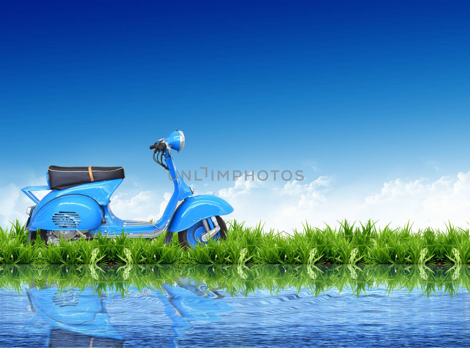 Vespa  on the grass with the bright sky