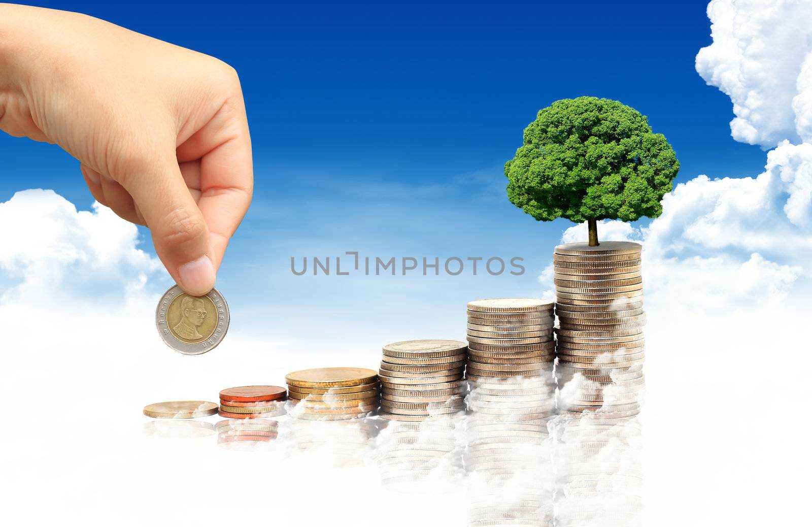 Invest. Conceptual image.  and lot of coins over blue sky background