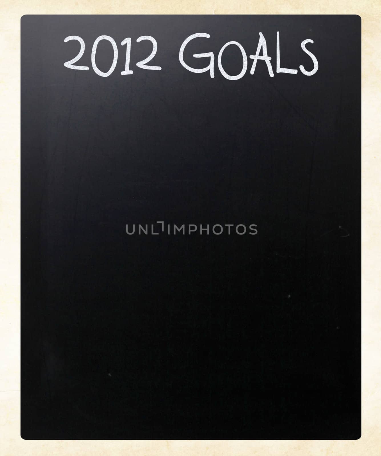 "2012 goals" handwritten with white chalk on a blackboard