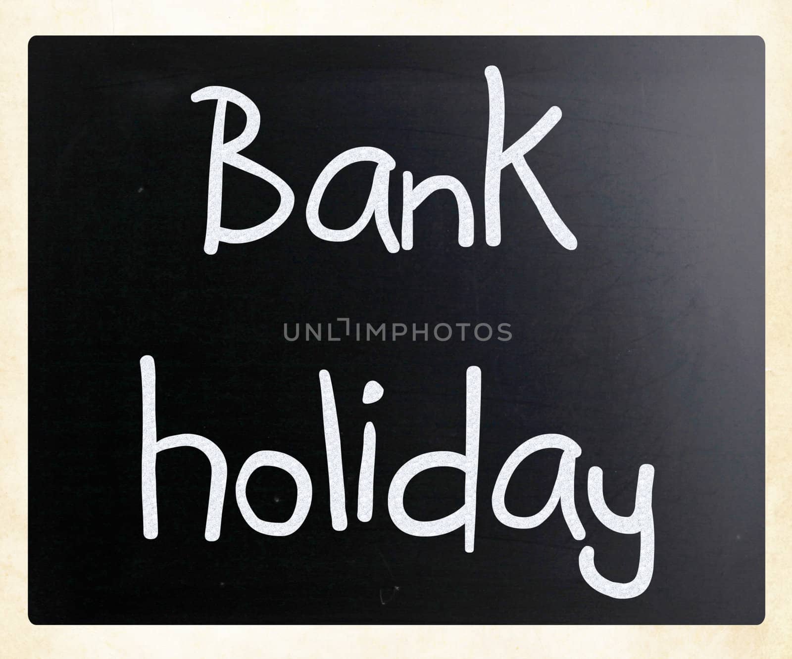 "Bank holiday" handwritten with white chalk on a blackboard