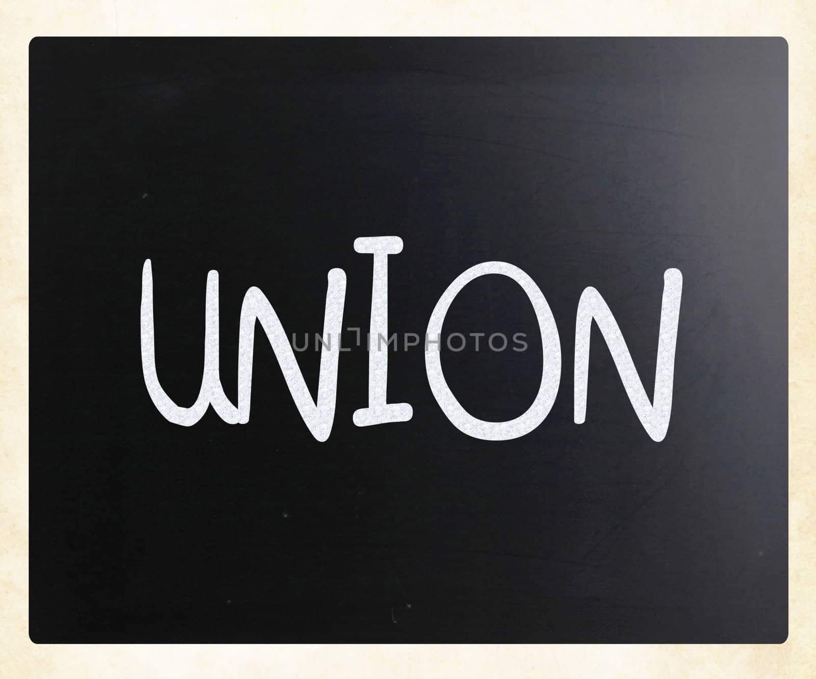 The word "Union" handwritten with white chalk on a blackboard