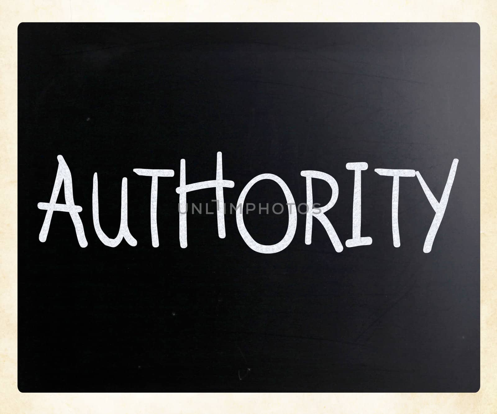 "Authority" handwritten with white chalk on a blackboard