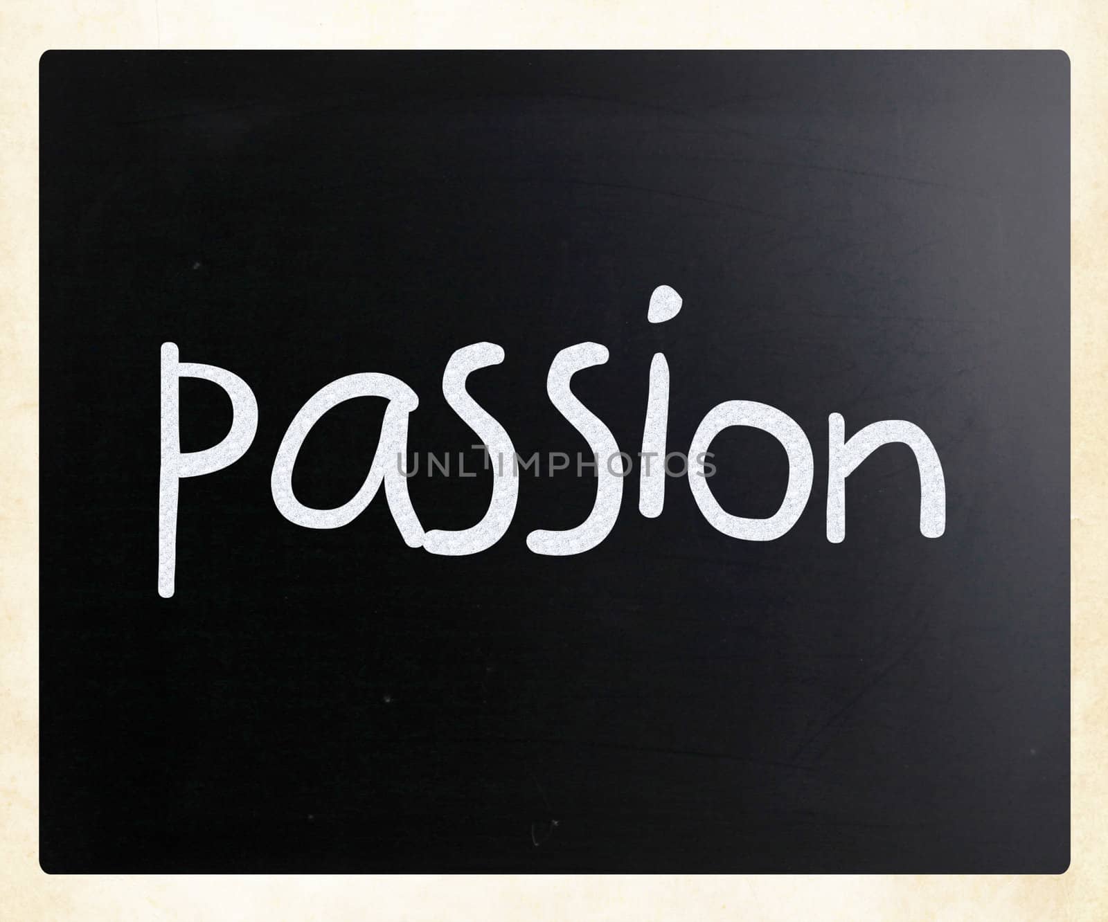 "Passion" handwritten with white chalk on a blackboard