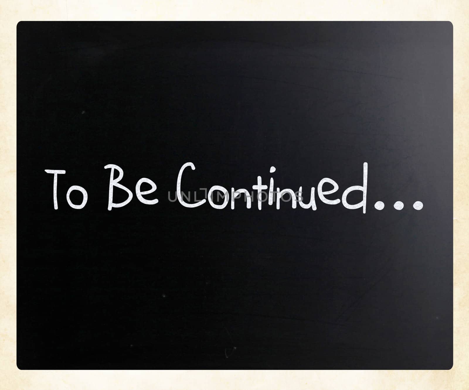 "To be continued" handwritten with white chalk on a blackboard