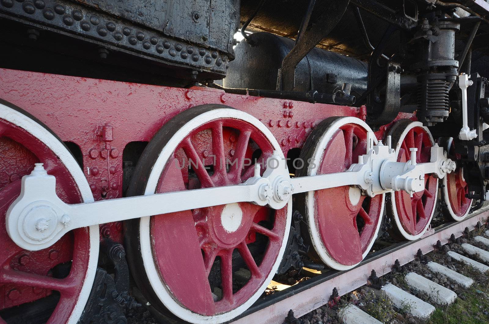 old steam locomotive wheel and rods real macro
