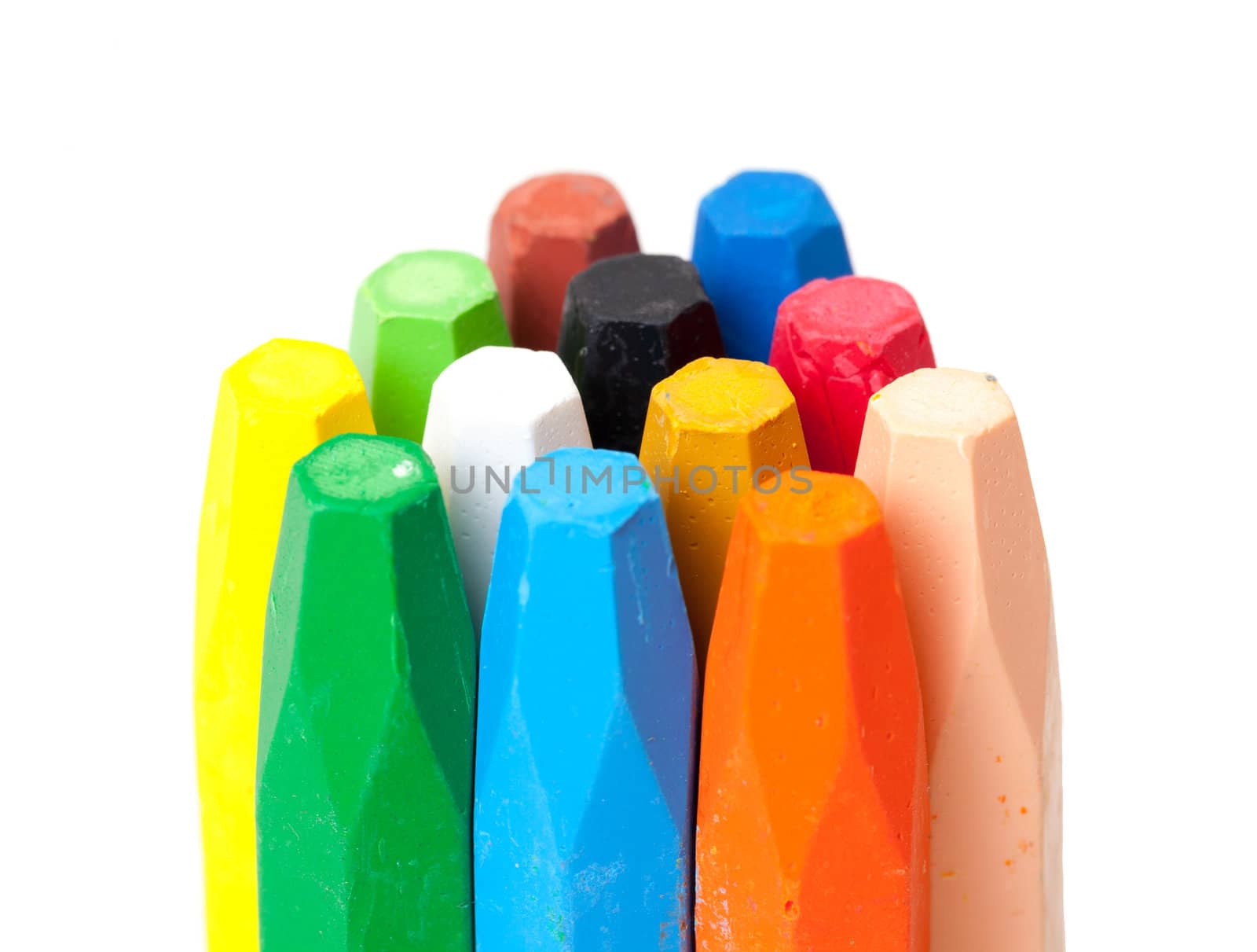 Group of Crayons stacked on white background