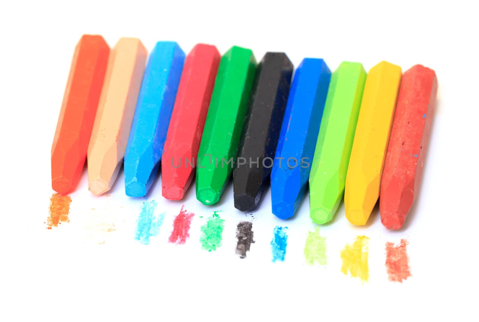 Group of Crayons stacked on white background