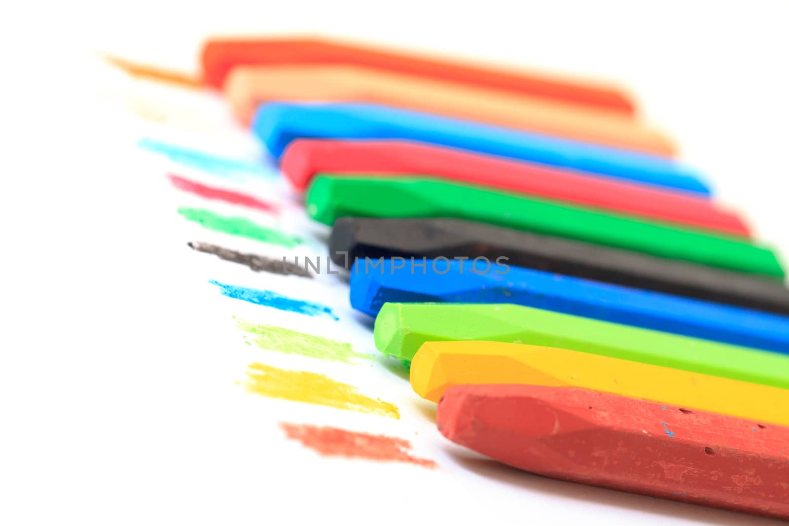 Group of Crayons stacked on white background