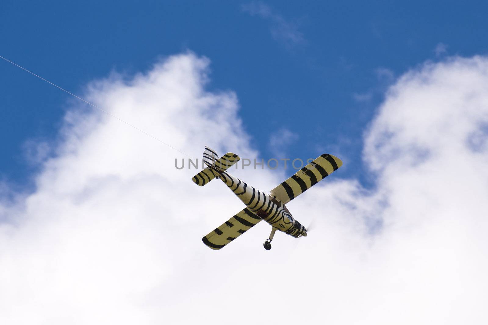 Flying model airplane with blue sky