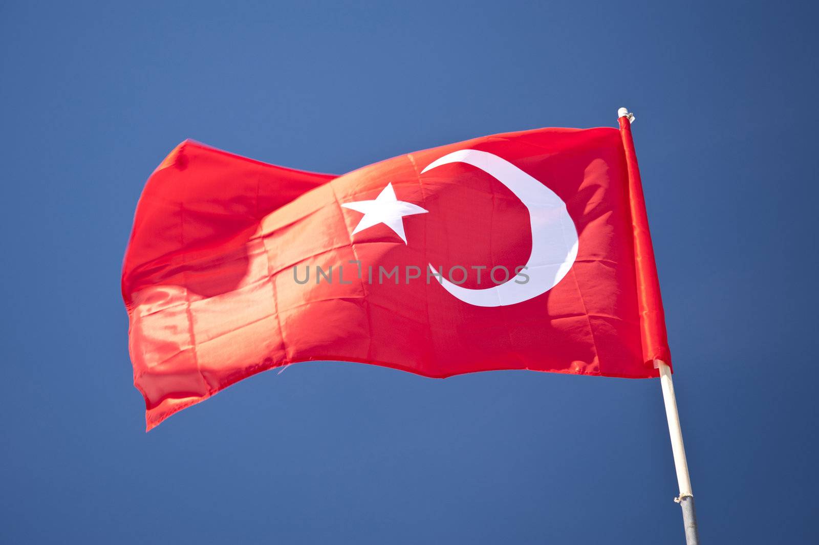 Flag of turkey before blue sky