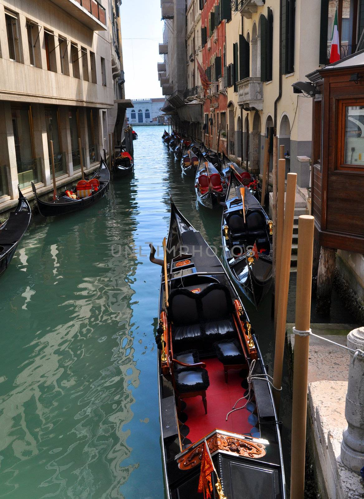 A typical water channel named Rio wih gondole - Venezia - Italy