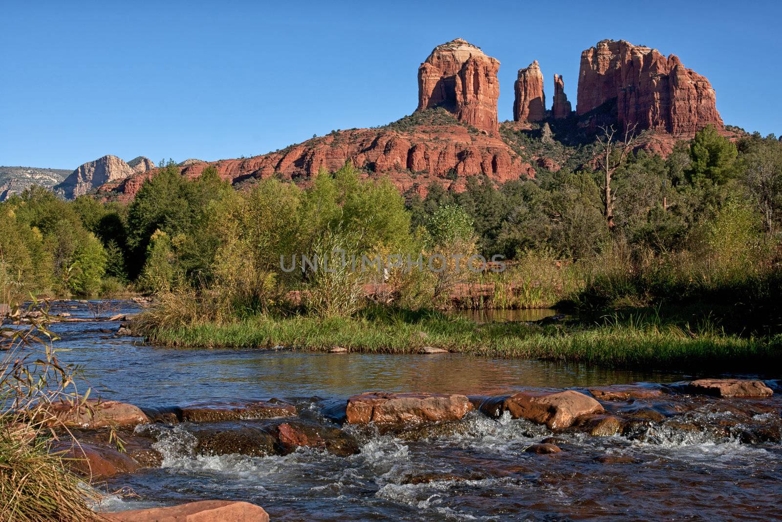 Cathedral Rock as seen from Oak Creek Crossing in Sedona. by Claudine